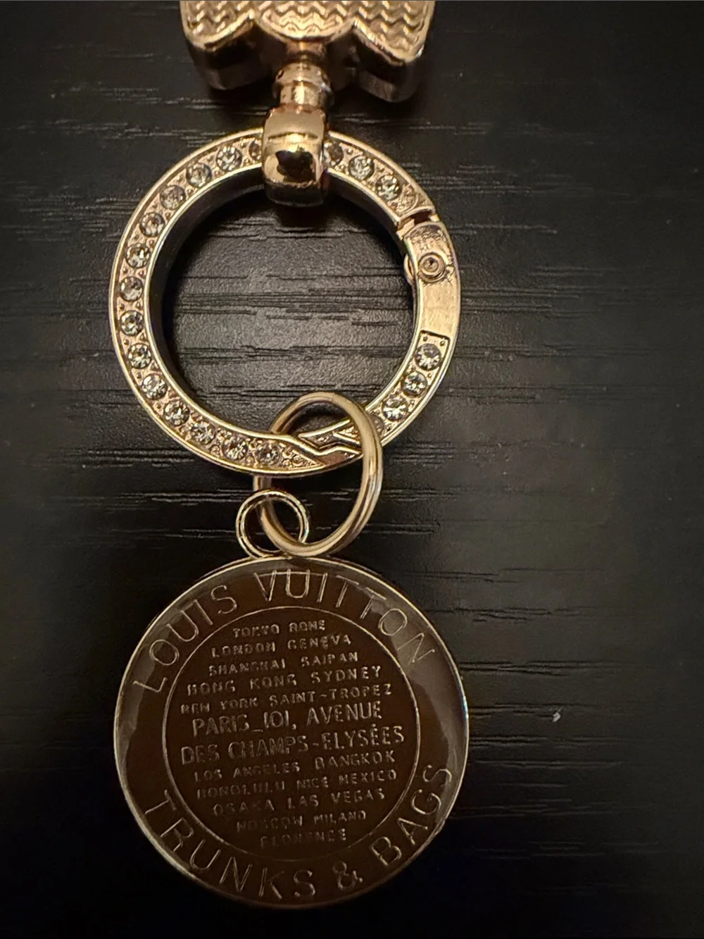 Inspired White Leather Strap Keychain with Brown Gold-Tone Medallion